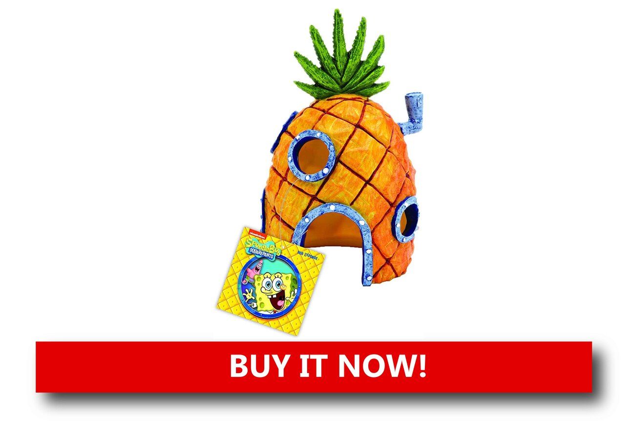 SpongeBob SquarePants Pineapple House Alt text: A detailed resin ornament of SpongeBob’s pineapple house placed on the gravel floor of a tropical-themed tank with fish swimming around it.