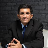 Ritesh Malik logo