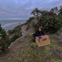 a moment unfolding // ursund live looper logo