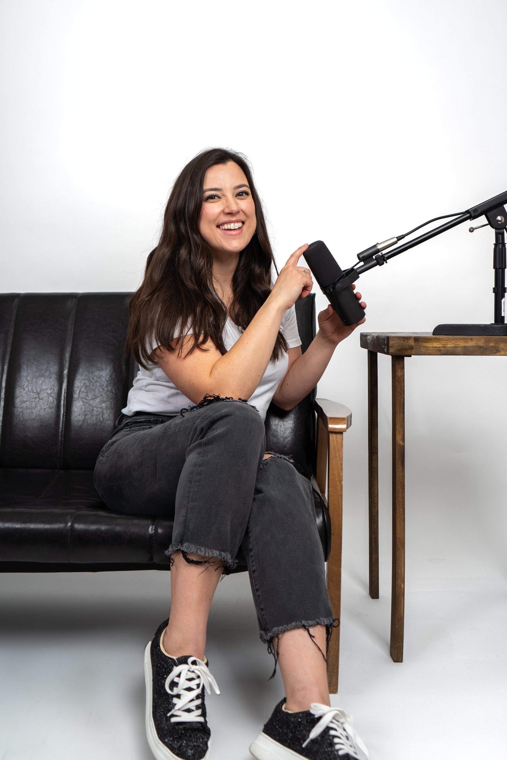 Kirsten smiling with microphone