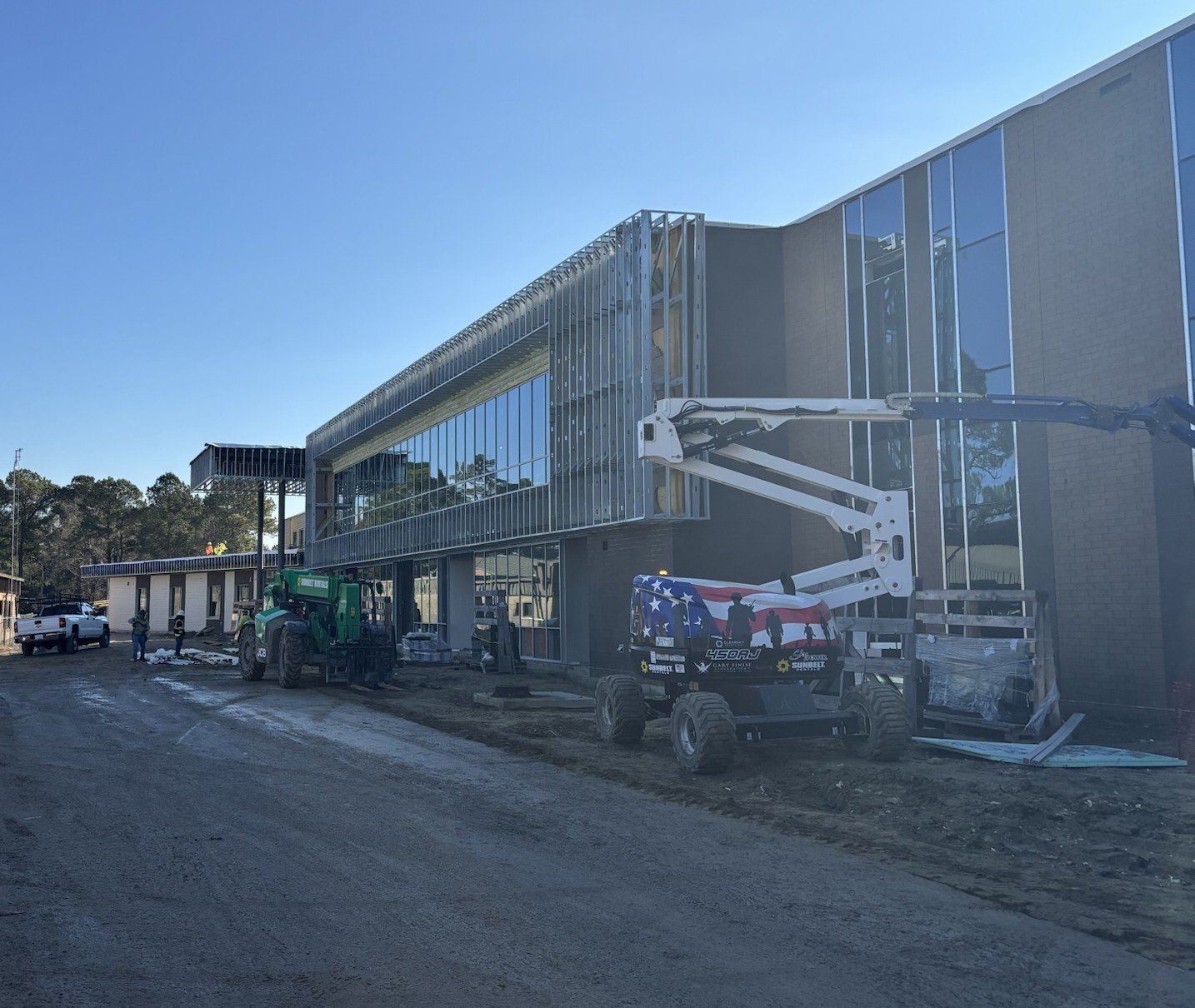 School construction photos and upcoming events at the School Board Meeting