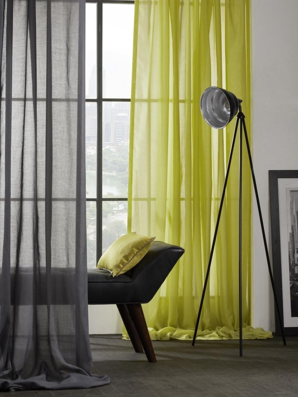 How Can You Make Windows Look Larger Using Curtains and Shades?