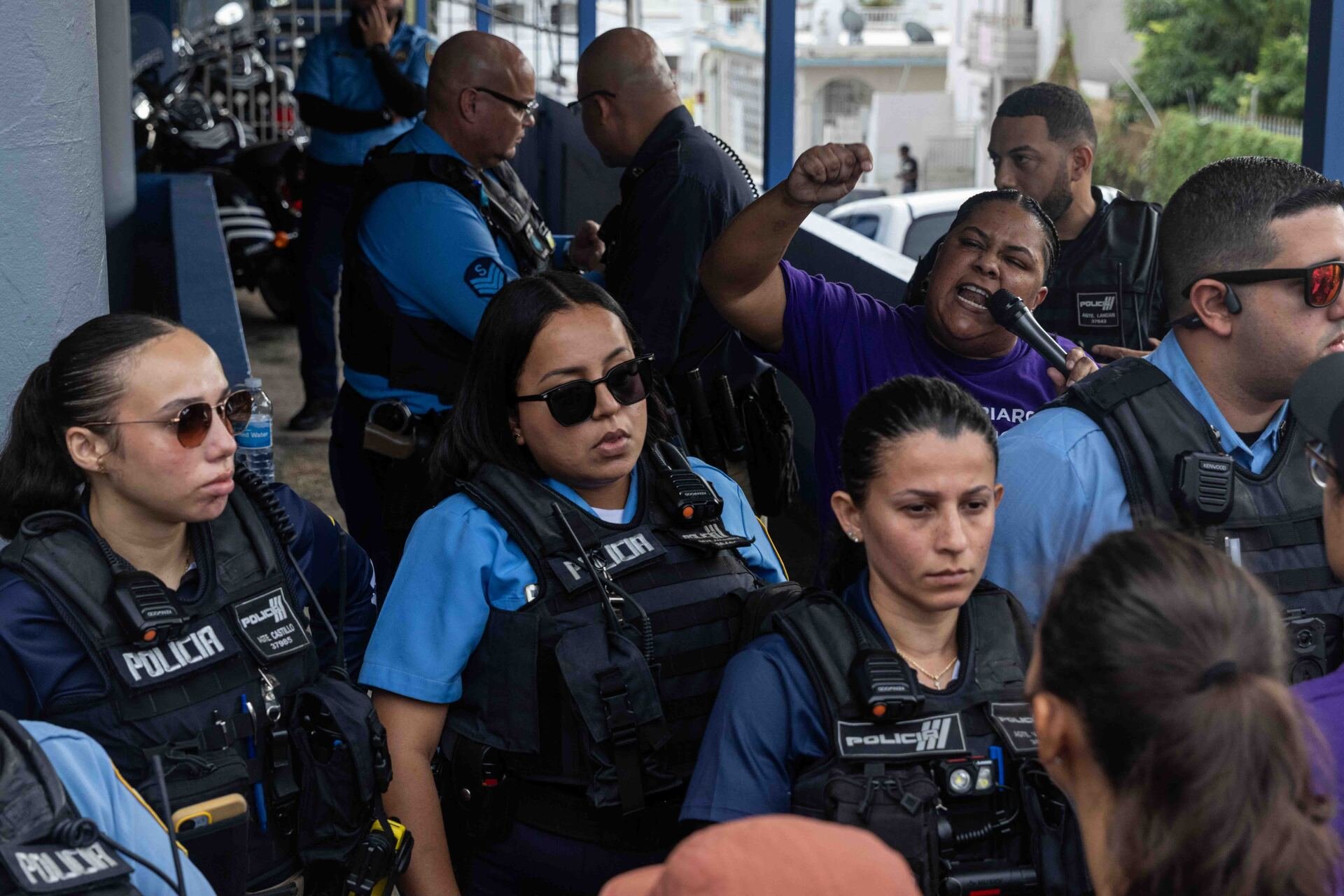 Activists Protest Immigration Detentions in San Juan Neighborhood