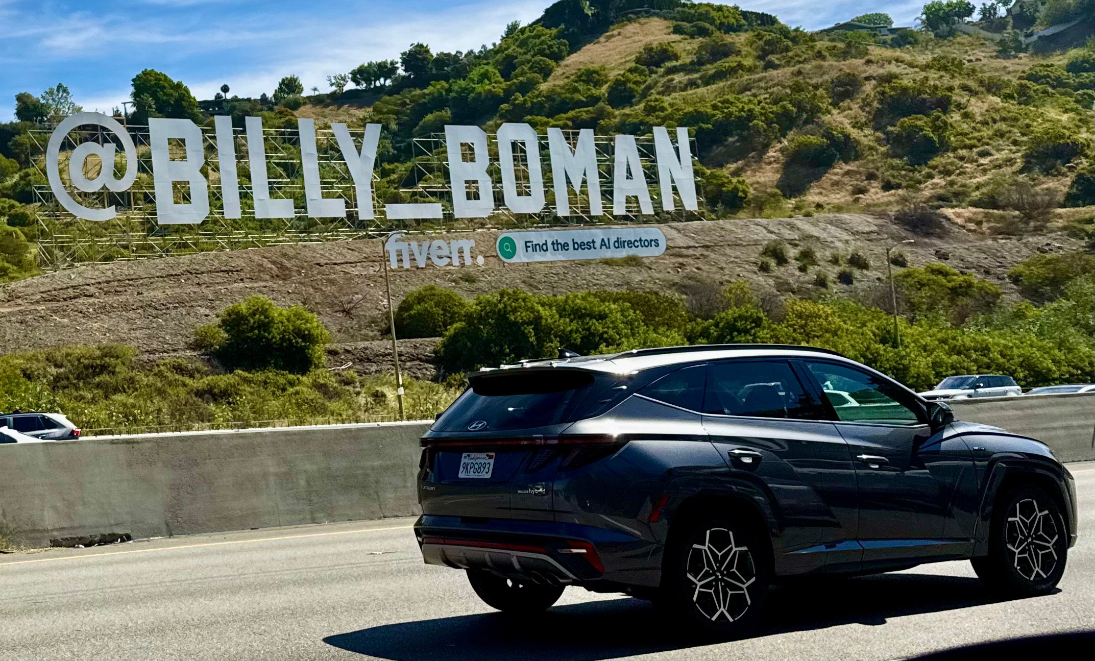 The story behind that gigantic ad over the 101