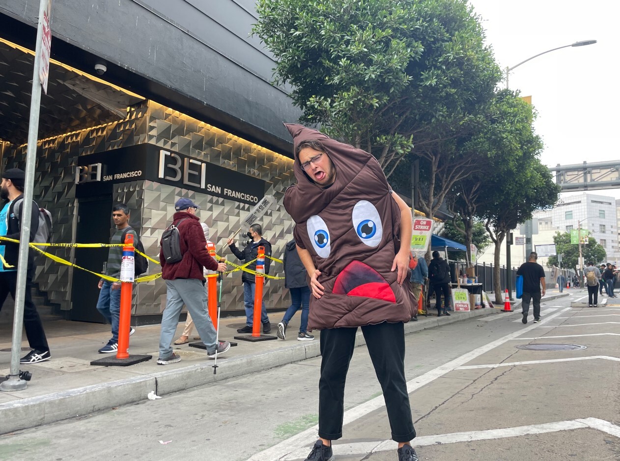 Protestor in Giant Turd Costume Joins SF BEI Hotel Picket Line