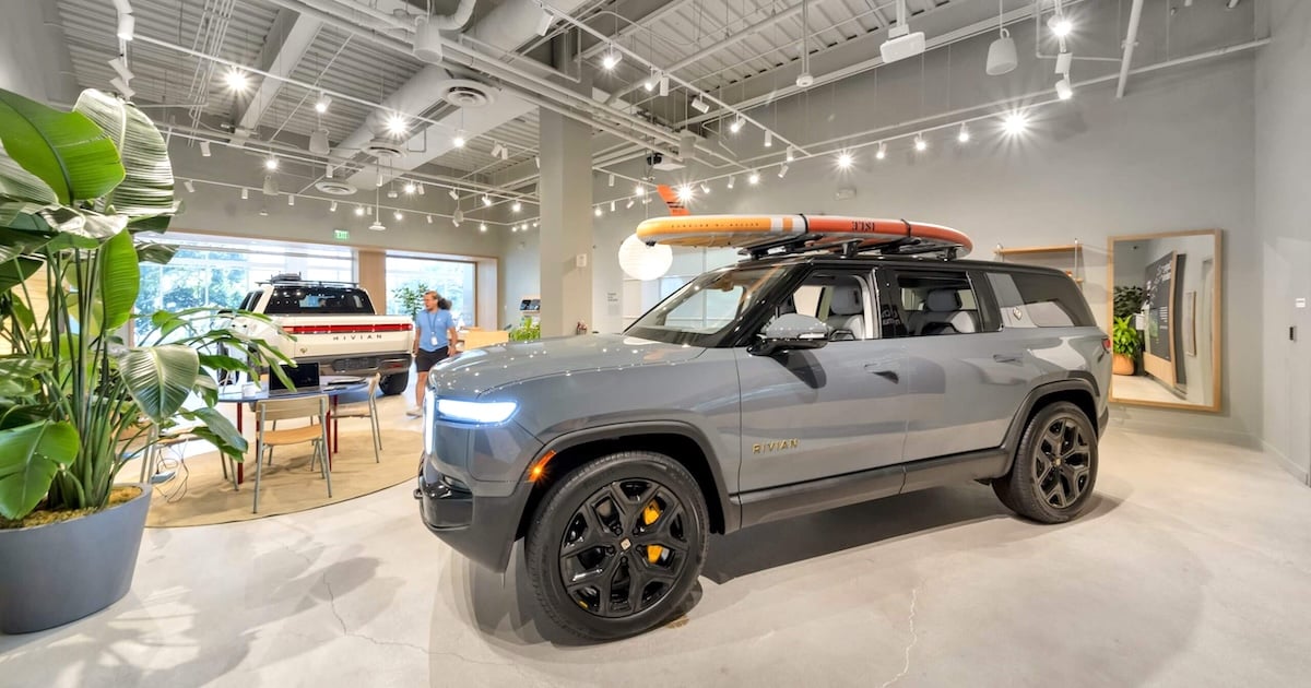 Rivian just signed a lease next to Porsche. That is not a coincidence.