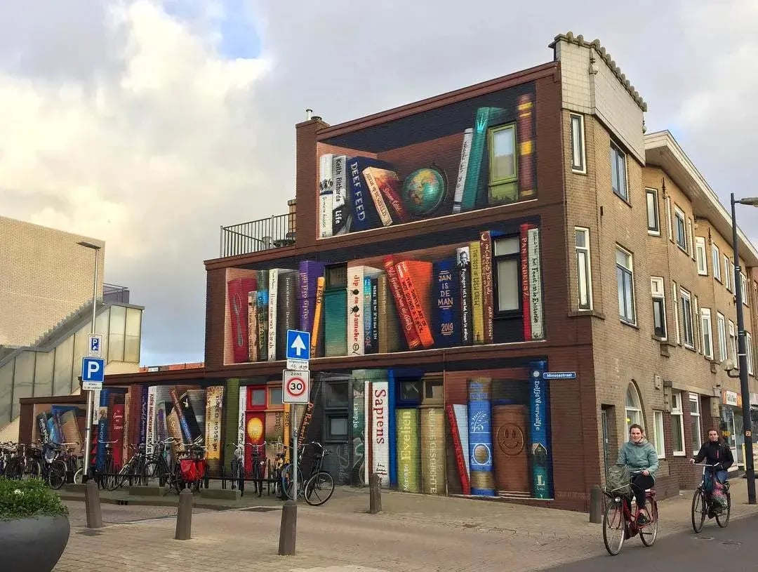 Hyperrealistic Bookshelf Murals in The Netherlands