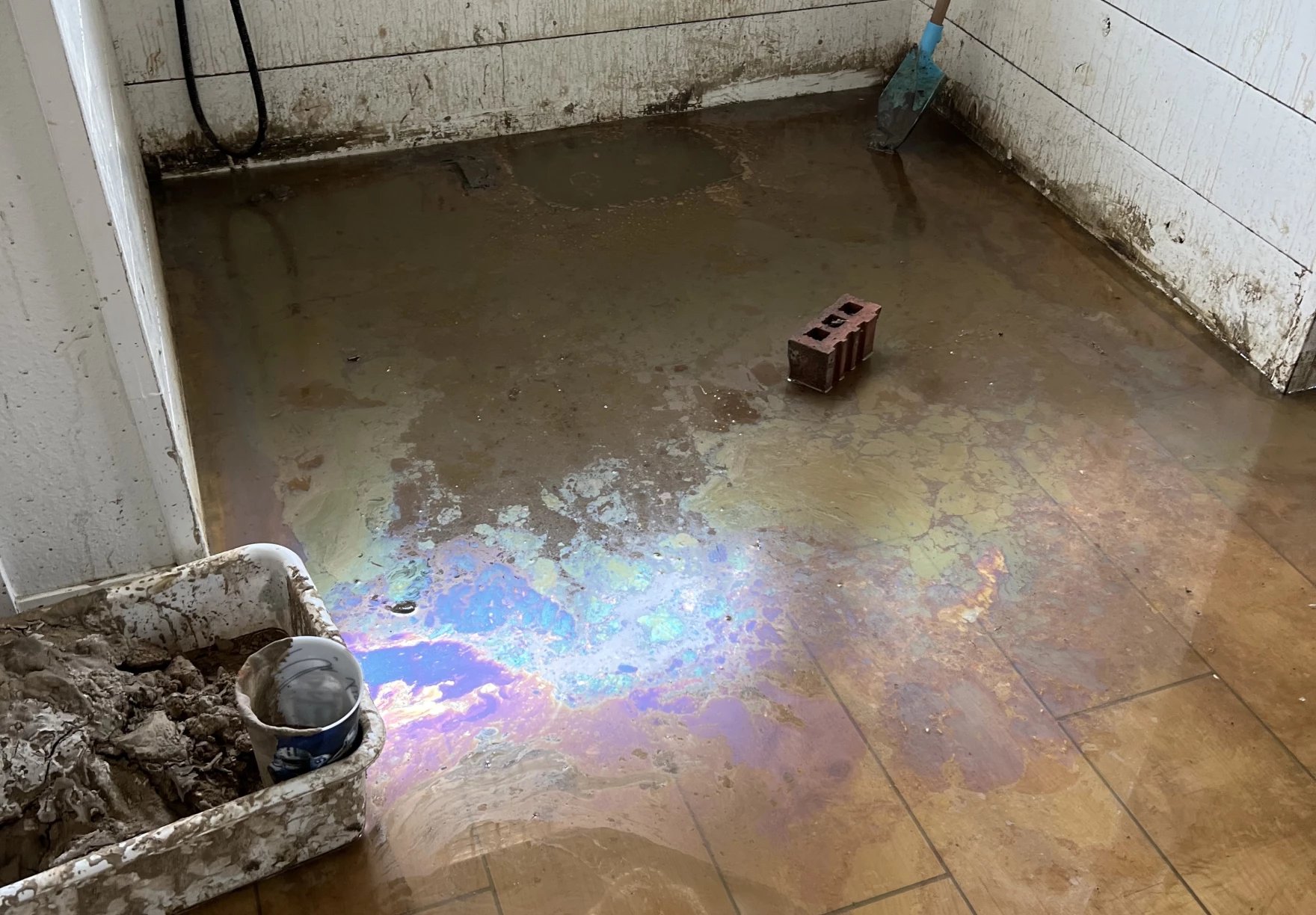 Their house is filling with oil. Oklahoma says its hands are tied