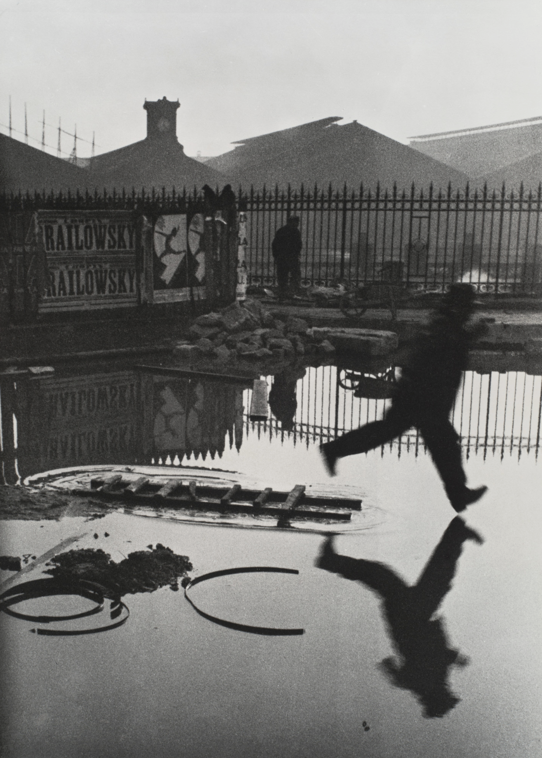 Behind the Gare Saint-Lazare (1932) - Henri Cartier-Bresson 
