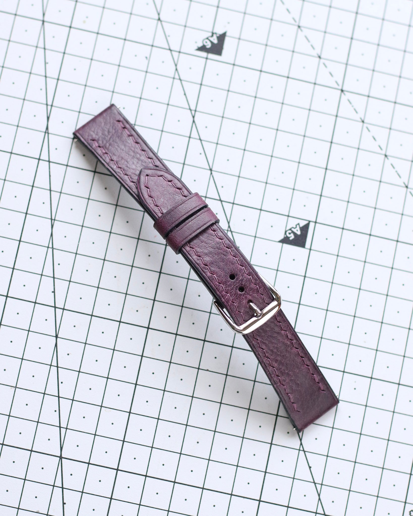 a bespoke watch strap made from purple Italian leather
