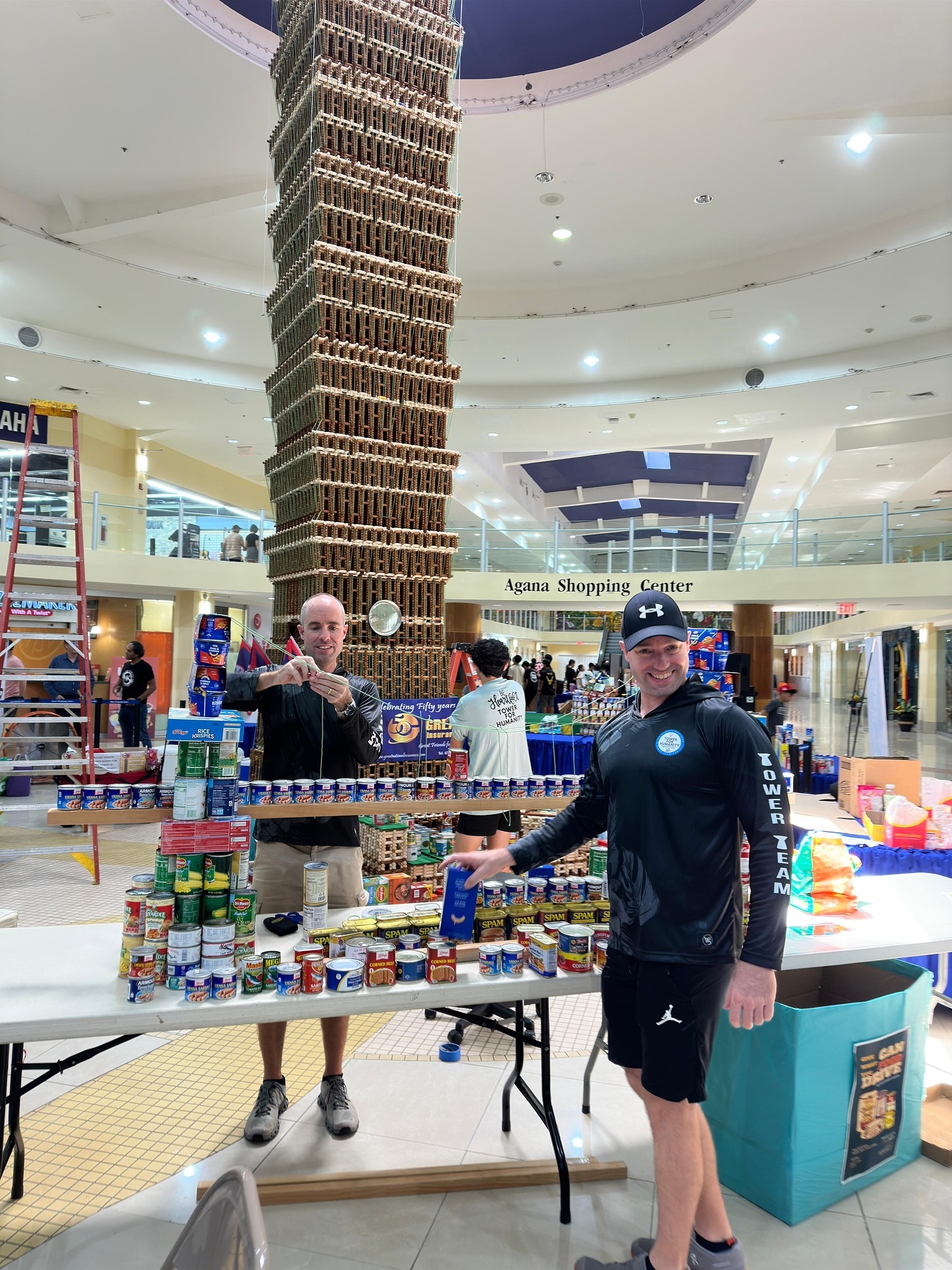 Aydletts prep Tower of Humanity as Canstruction food drive gets underway