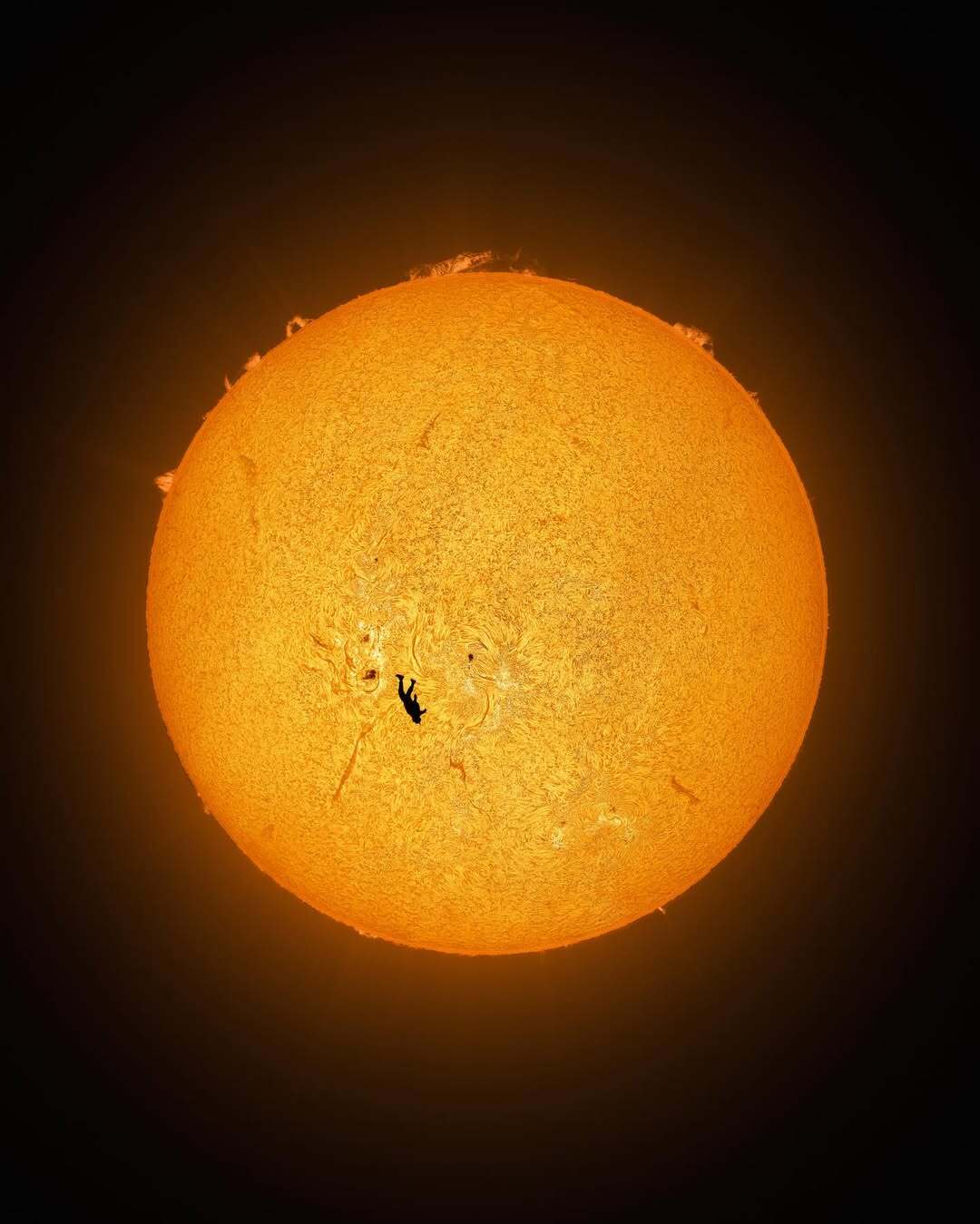 Unbelievable Photo Captures Skydiver Falling In Front of the Sun