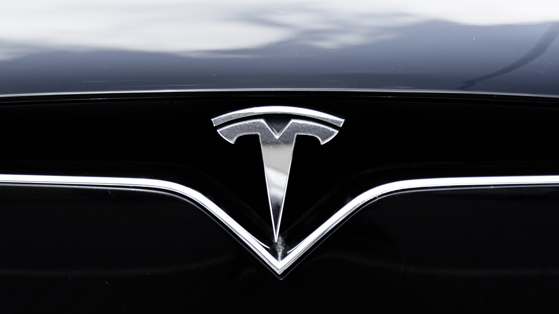 Tesla bets on affordable model, robotaxis amid sales slide