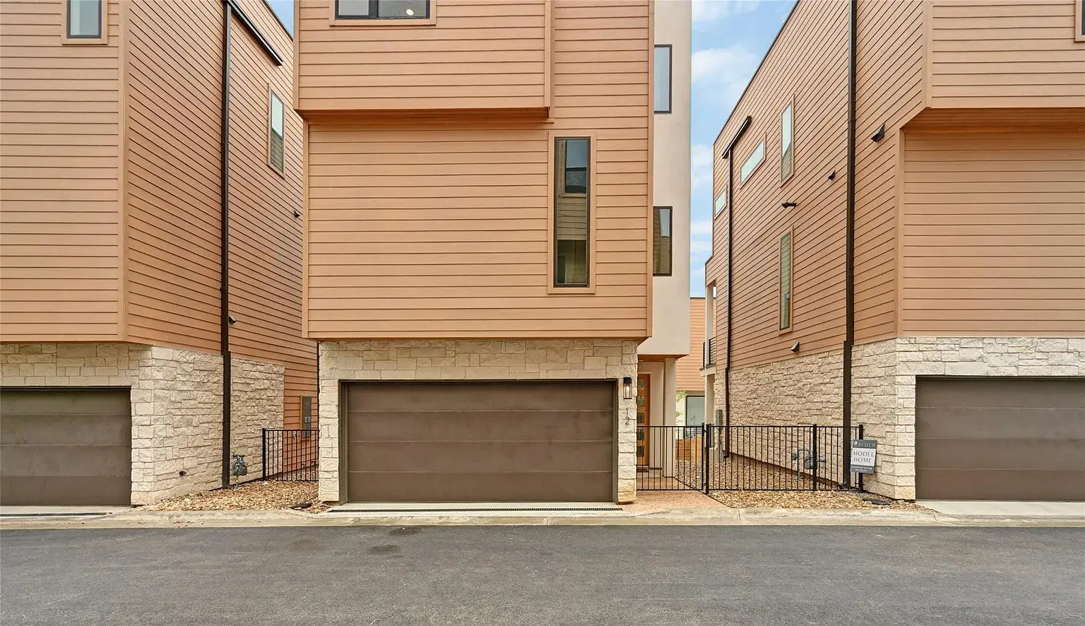 Modern three level condo with big windows, bright interiors and Hill Country convenience