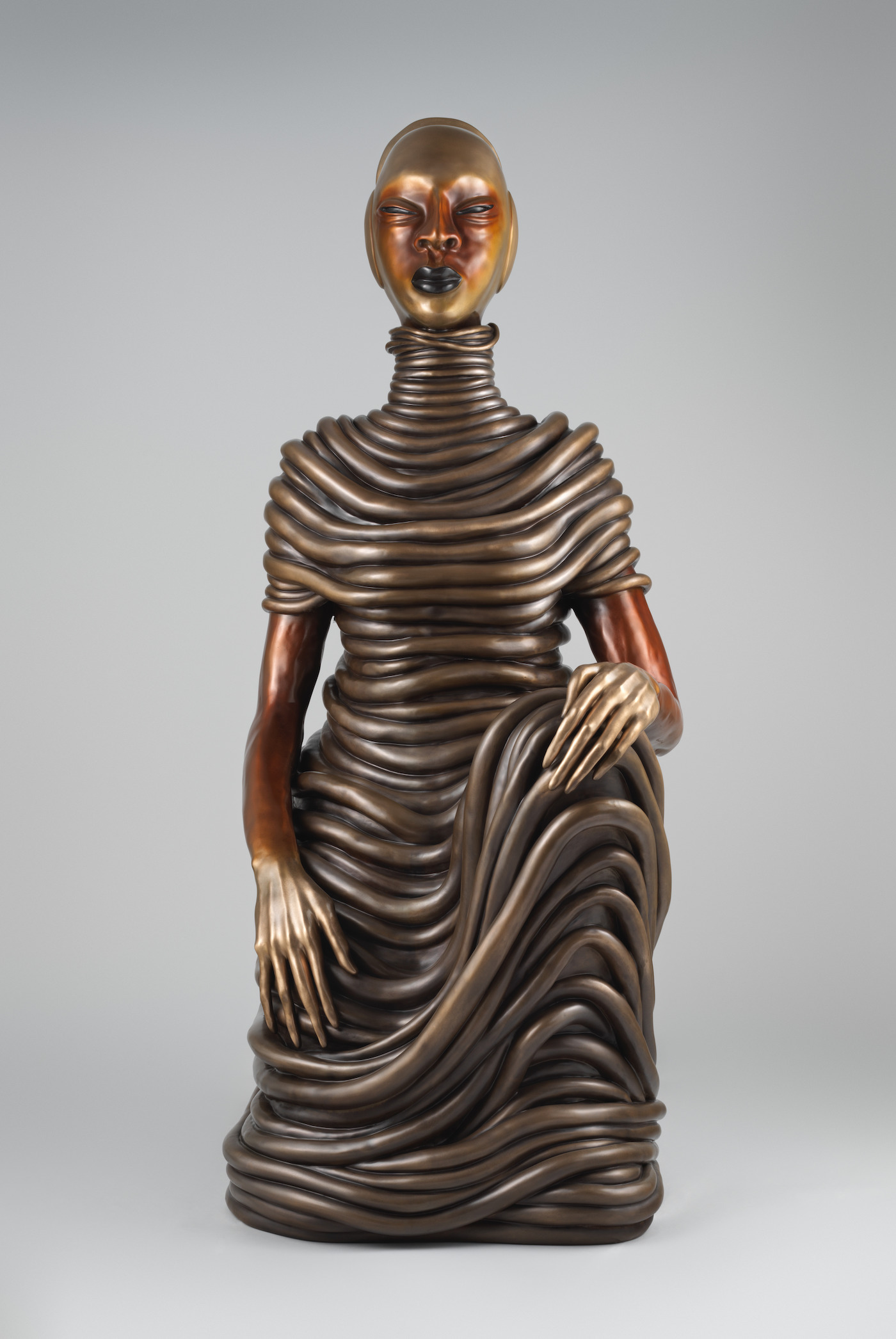 Regal African Women Sculptures in Bronze Outside the Met Museum in New York