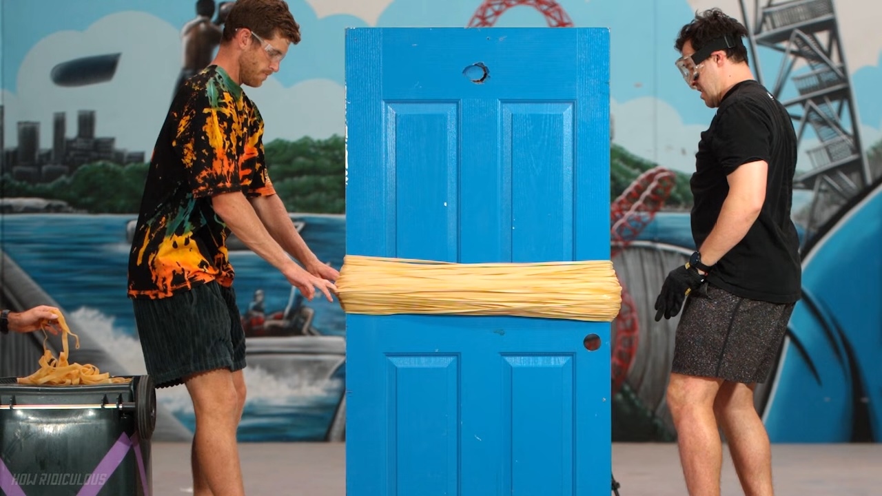 Random Objects Succumbing to the Immense Pressure of Rubber Bands