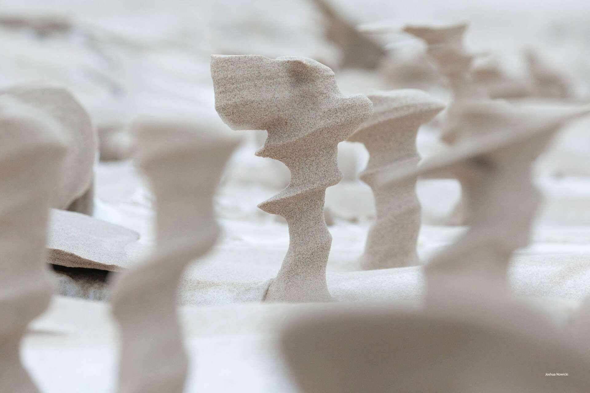 Lake Michigan’s Frozen Sand Sculpted into Abstract Pillars