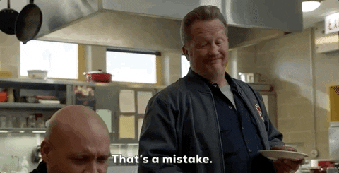 GIF with two men, with the subtitle "That's a mistake".