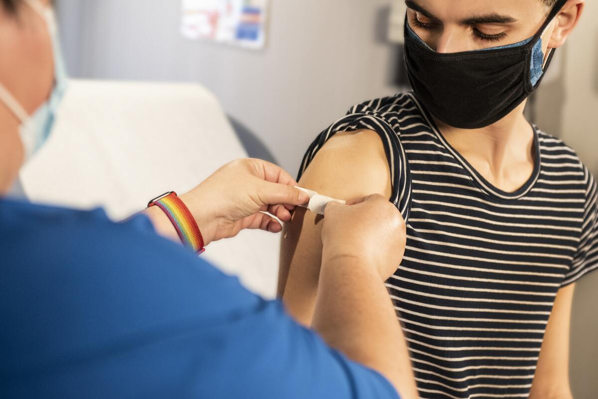 Man gets band-aid after vaccine