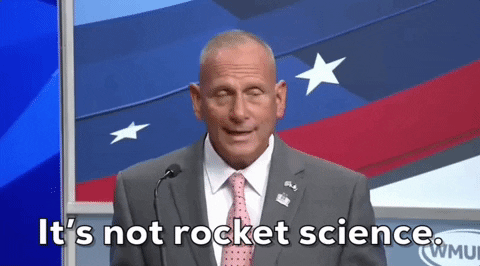 GIF of man saying it's not rocket science against the US flag