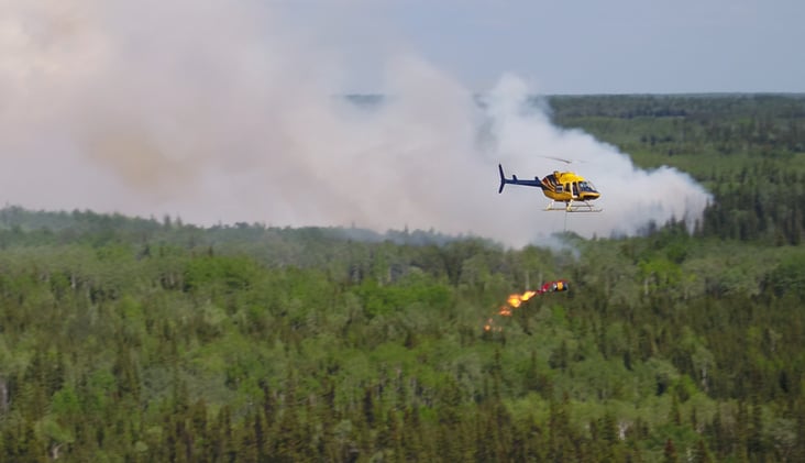 The heli-torch: the fiery tool in a wildfire helicopter pilot's arsenal