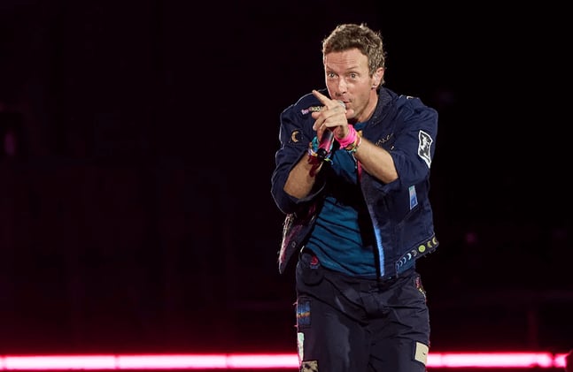 Chris Martin’s Kiss Cam Joke at Coldplay Concert Sparks Affair Speculation