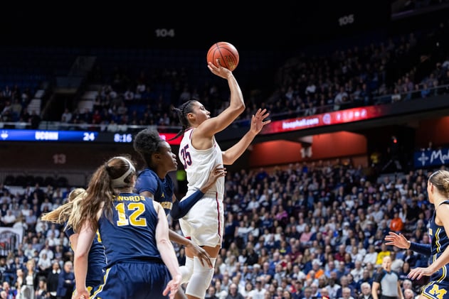 Azzi Fudd saves the day to help UConn stave off comeback bid from No. 6 Michigan