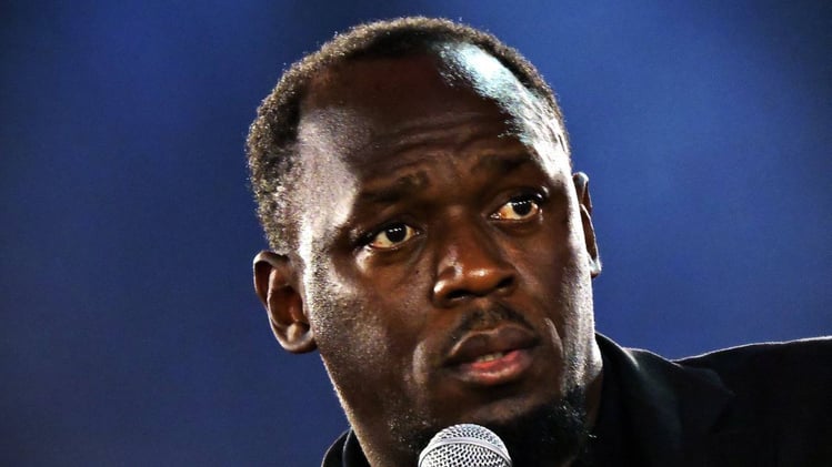 Usain Bolt And Fans Pray for Jamaica  