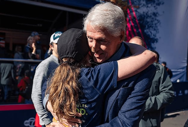 Former President Bill Clinton Cheers on Daughter Chelsea at NYC Marathon With Bandaged Nose