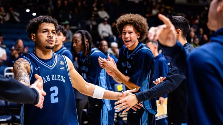 Holiday Heroics: Johnson Banks in Buzzer-Beater to Stun Tritons