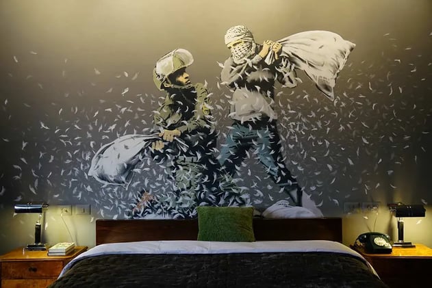 Banksy’s ‘Walled Off Hotel’ Reopens 