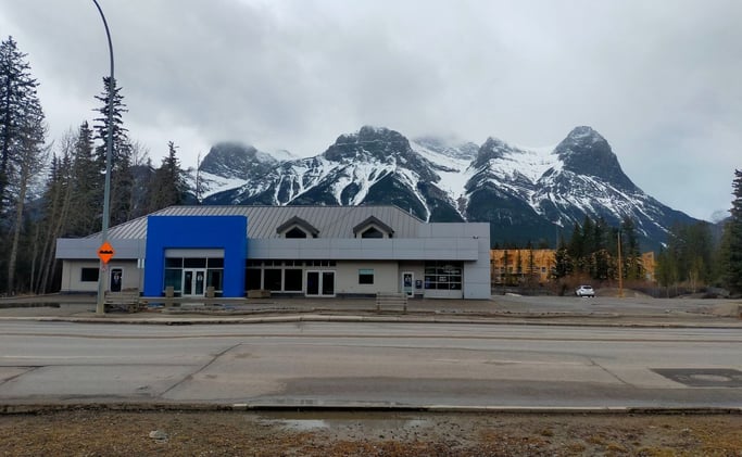 Former Canmore Car Dealership Listed for $10.9M as Rare Hotel Development Opportunity