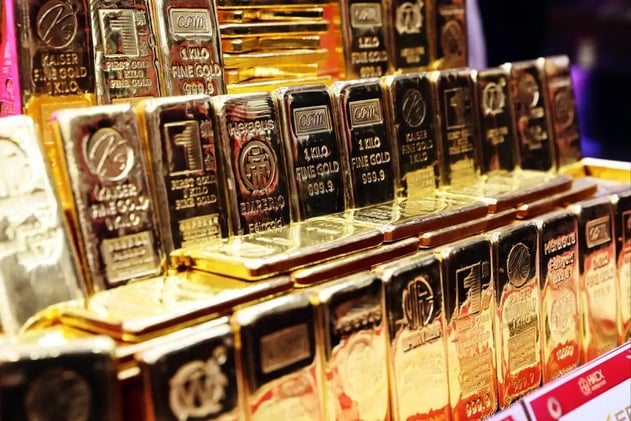 Gold price tops $4,900 per ounce for first time