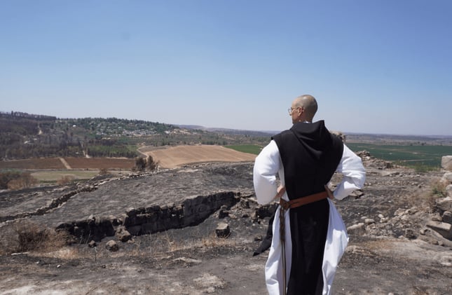Israeli Volunteers Assist Monks in Replanting Vineyard After Arson Fires