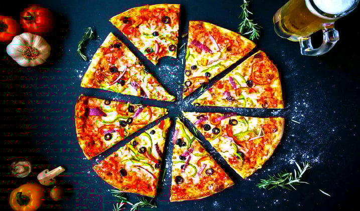 Crypto Startup Brings Bitcoin Adoption to Domino’s Pizza