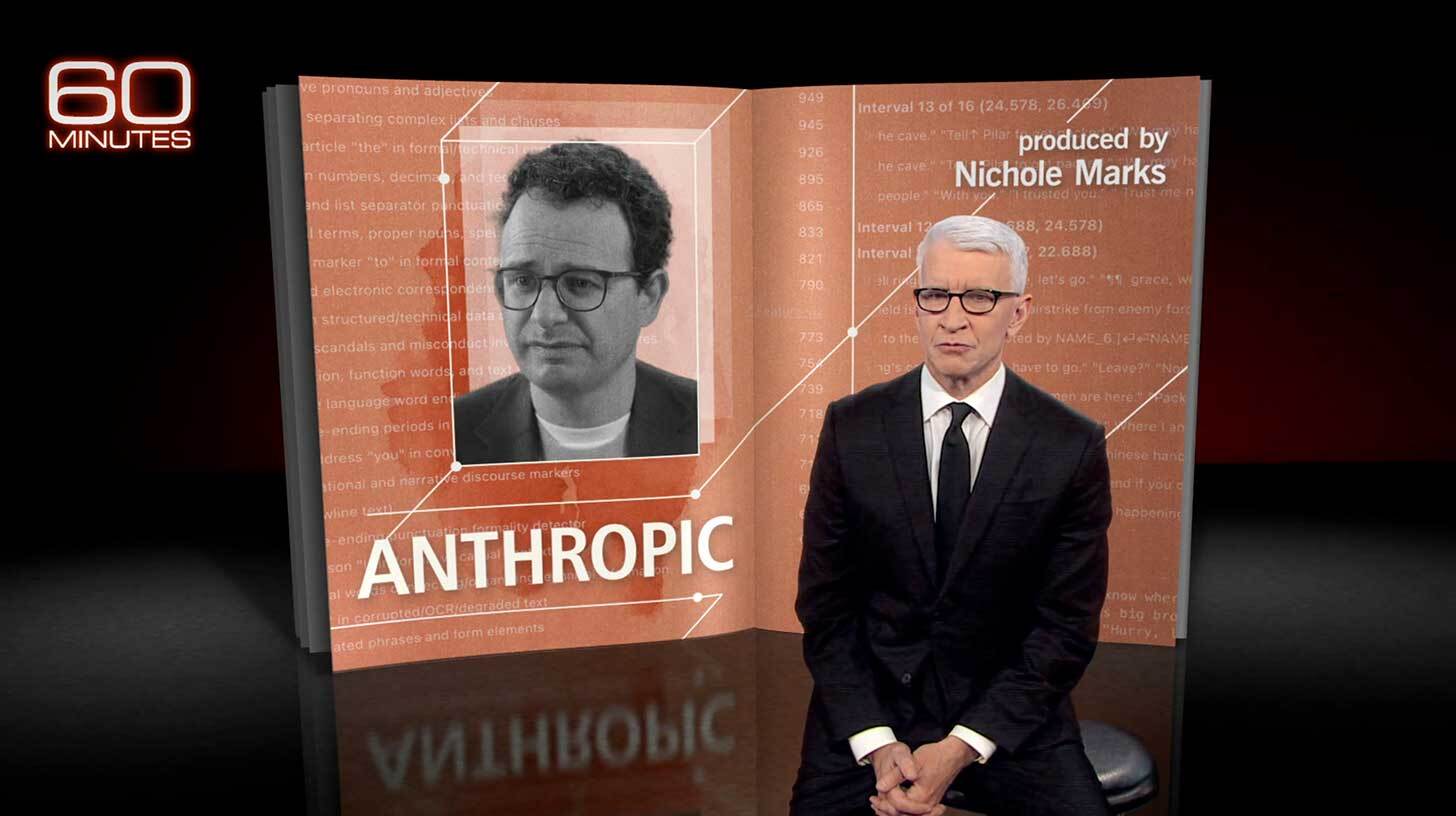 Mustal taustal istub musta ülikonda kandev mees. Tema taga on ekraan, millel on inimese foto, suur tekst 'ANTHROPIC' ja tekst 'produced by Nichole Marks'. Vasakus ülanurgas on '60 MINUTES' logo.