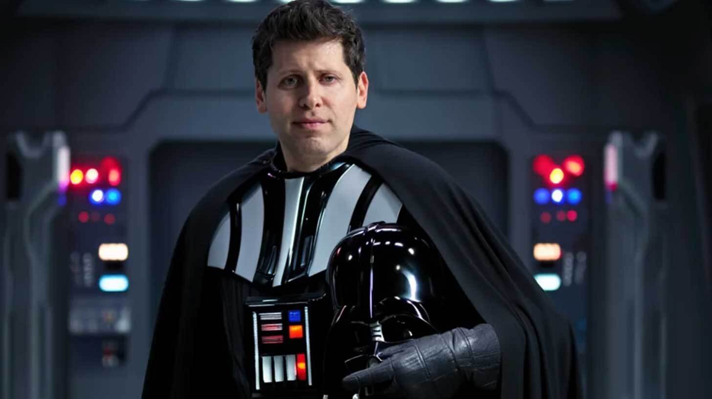 Mees, kellel on seljas Darth Vaderi kostüüm, seisab siseruumis, kus taustal on näha tehnoloogiaga seotud üksikasju. Mees hoiab ühes käes Darth Vaderi kiivrit.