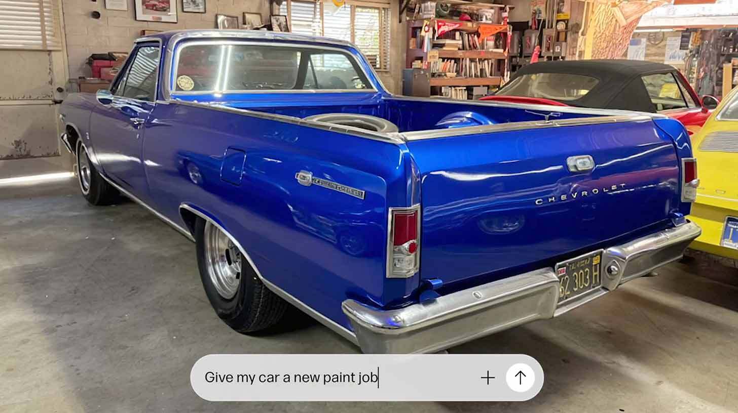 Sinise värviga Chevrolet pickup asub garaažis. Auto ümbruses on riiulid, tööriistad ja teised autod. Foto all on tekst, mis ütleb: "Andke mu autole uus värvikiht."